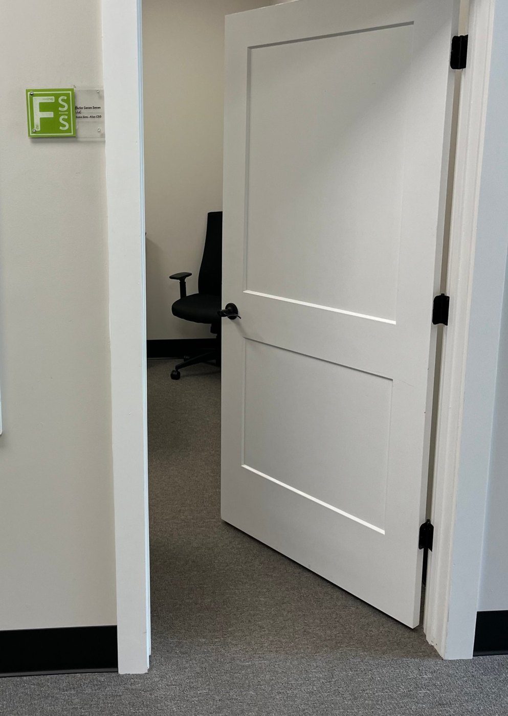Factor Seven Seven office entrance with the FSS sign