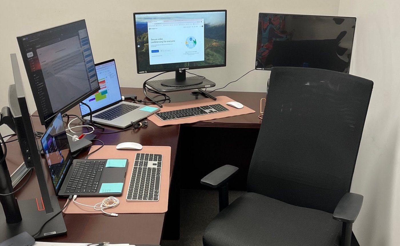 Multi-monitor workstation in the Factor Seven Seven office